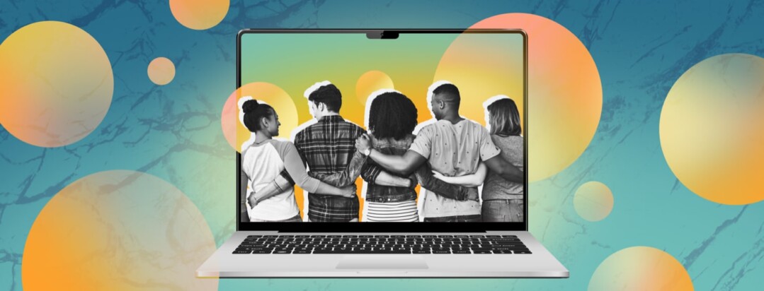 A group of people hug each other inside the screen of a laptop.